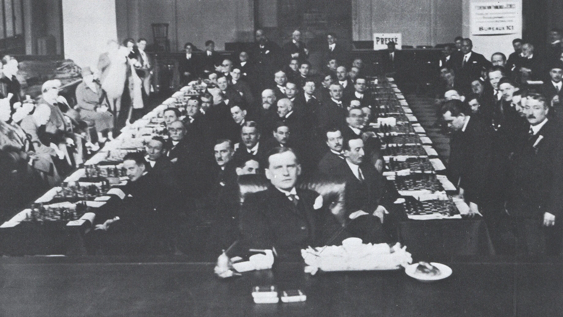 Alexander Alekhine playing blindfold against 28 opponents in Paris in 1925