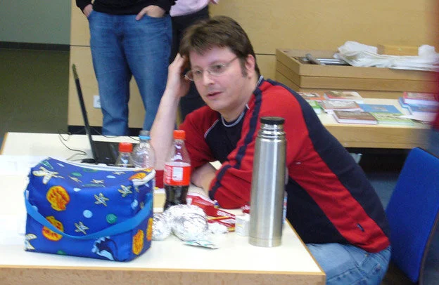  Lang at his snack-filled table. 